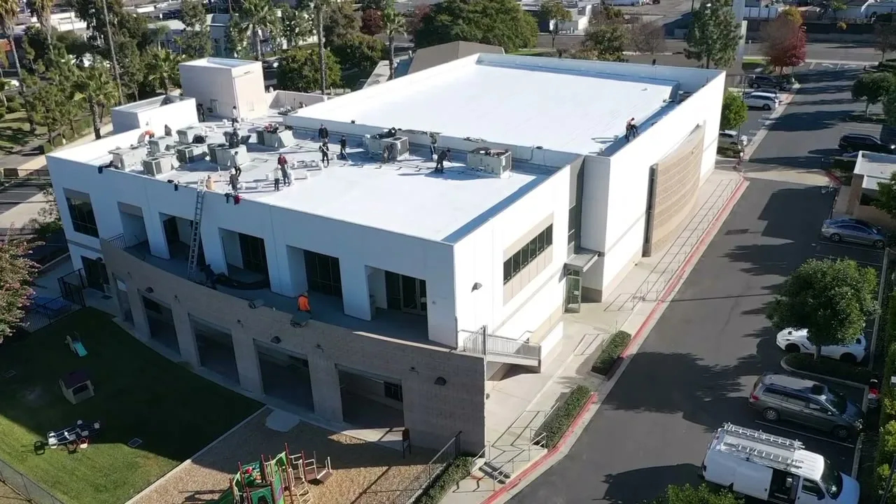 Flat commercial roof on an Orange County building (photo placeholder, real photo pending)