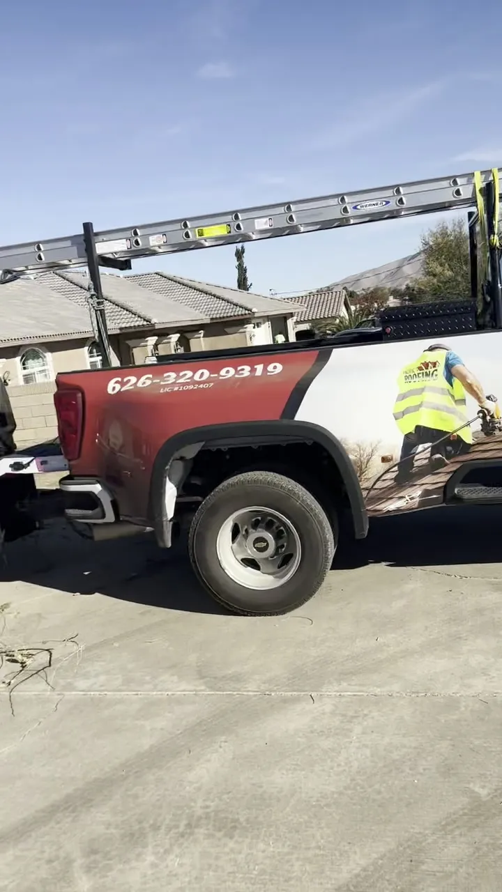 The Pacific Roofing truck on a residential reroof job